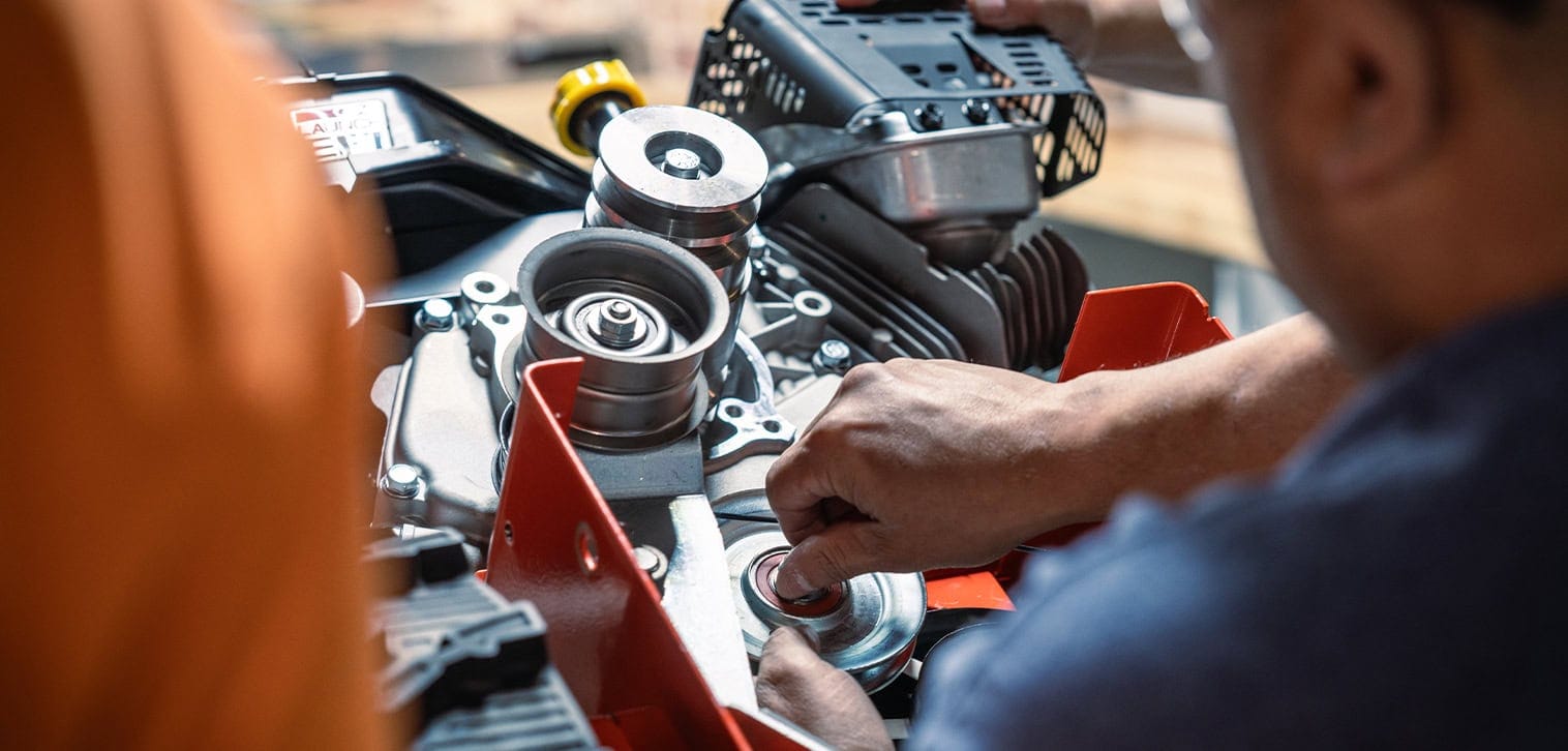 Ariens factory worker, working on assembling a brand new Zero-Turn mower